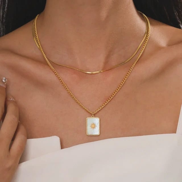 Hermoso collar doble sol